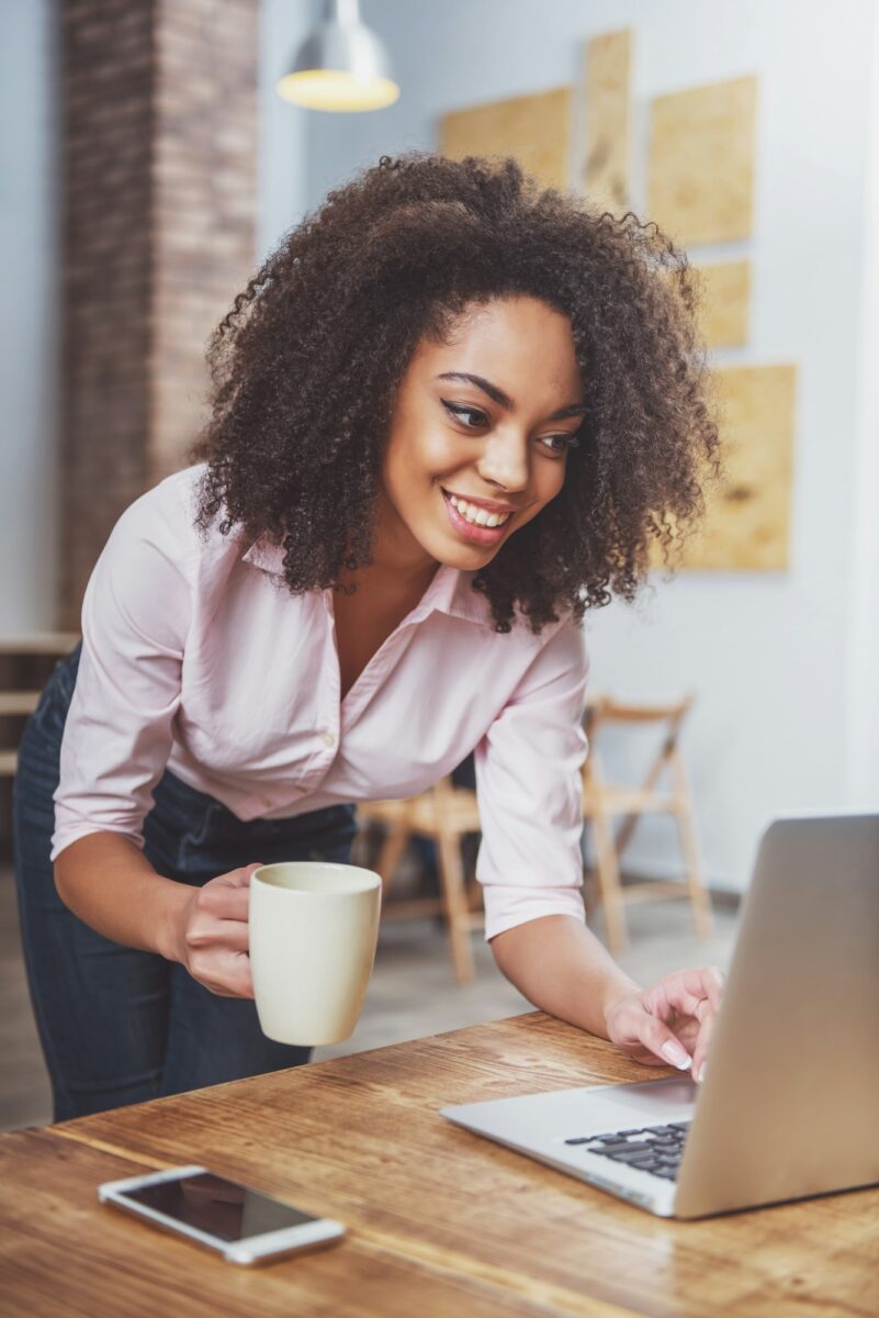 Beautiful Afro-American woman working